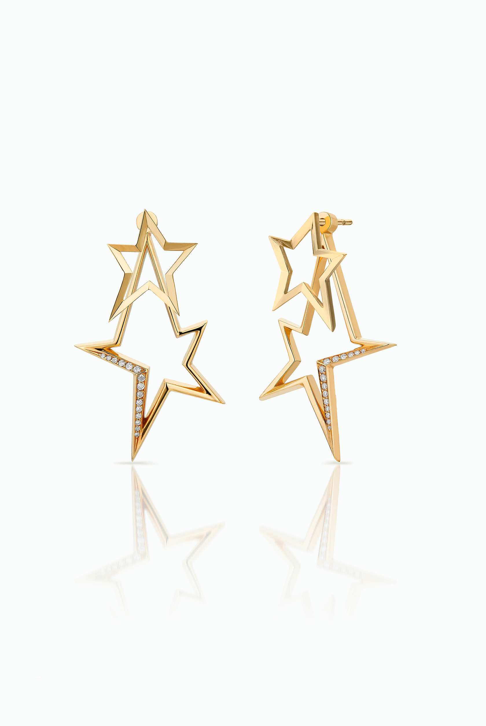 gold turbillion with star studs